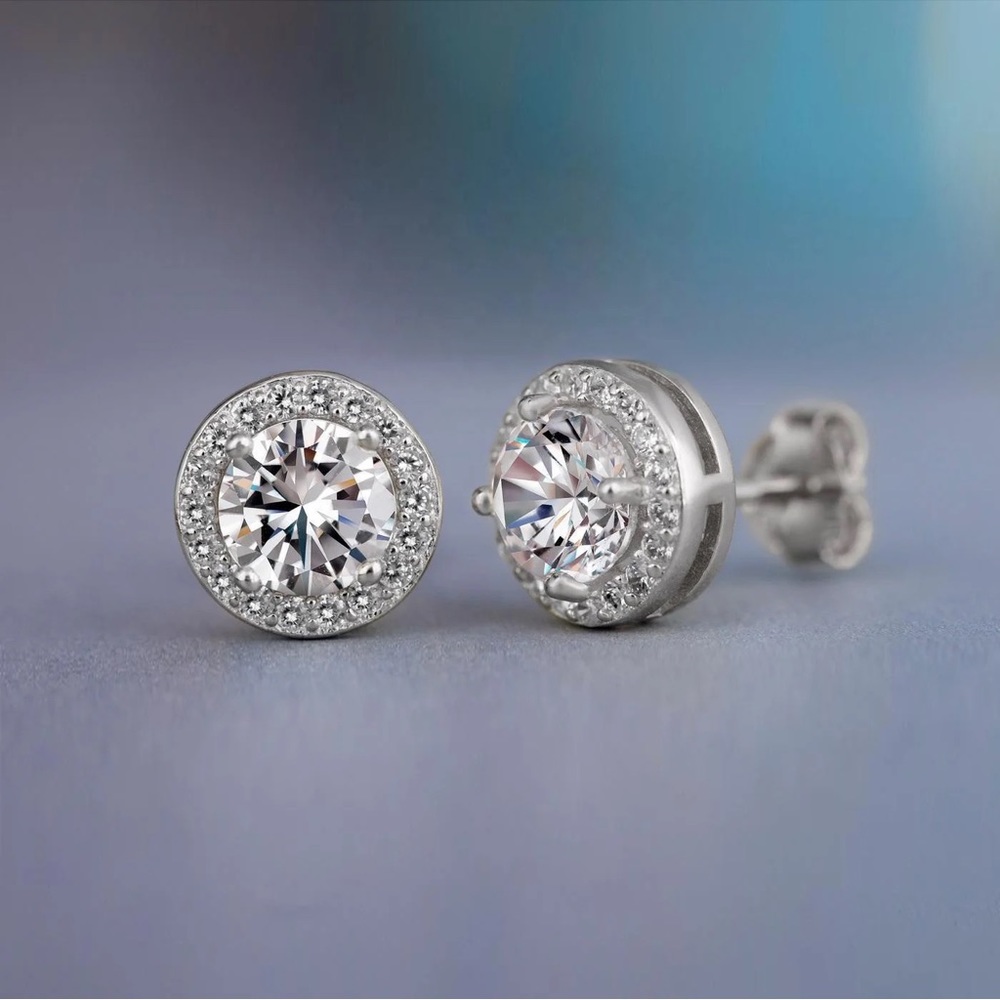 New silver earrings, cubic round zirconia.
